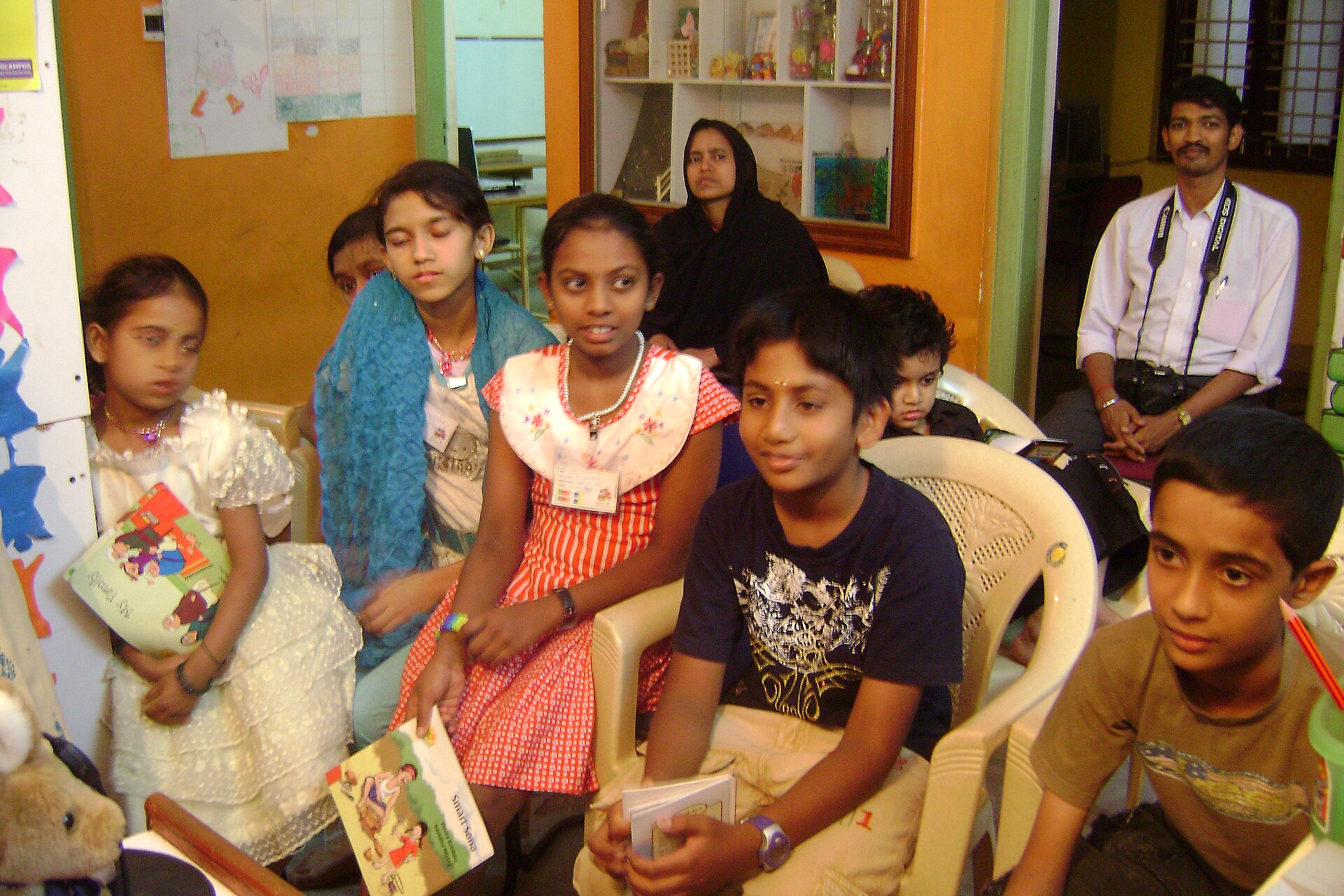 Children in a question and answer session after a reading