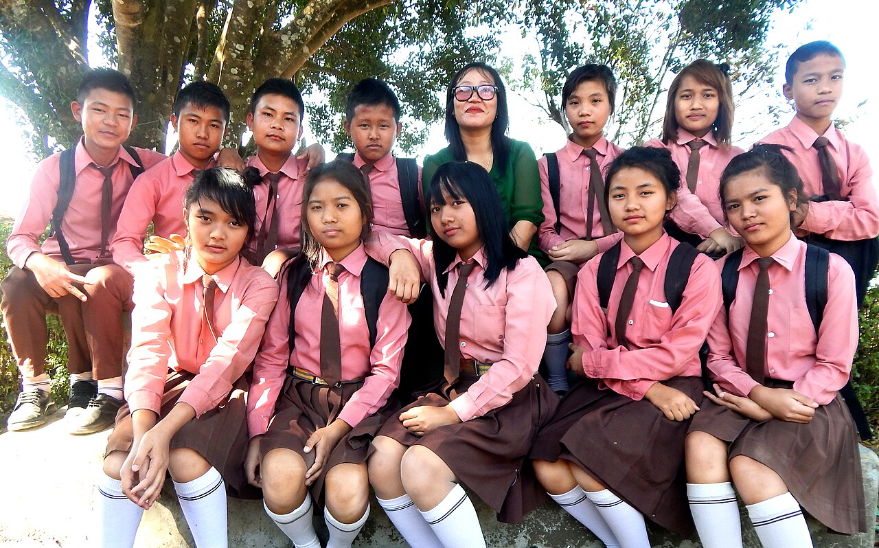 A class with their teacher at Hnahthial, Mizoram